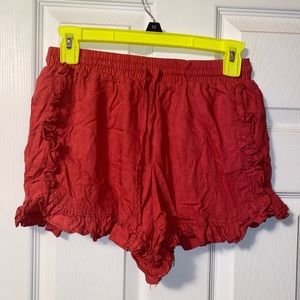 orange ruffled shorts